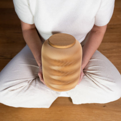 Nami urn made of wood fibers